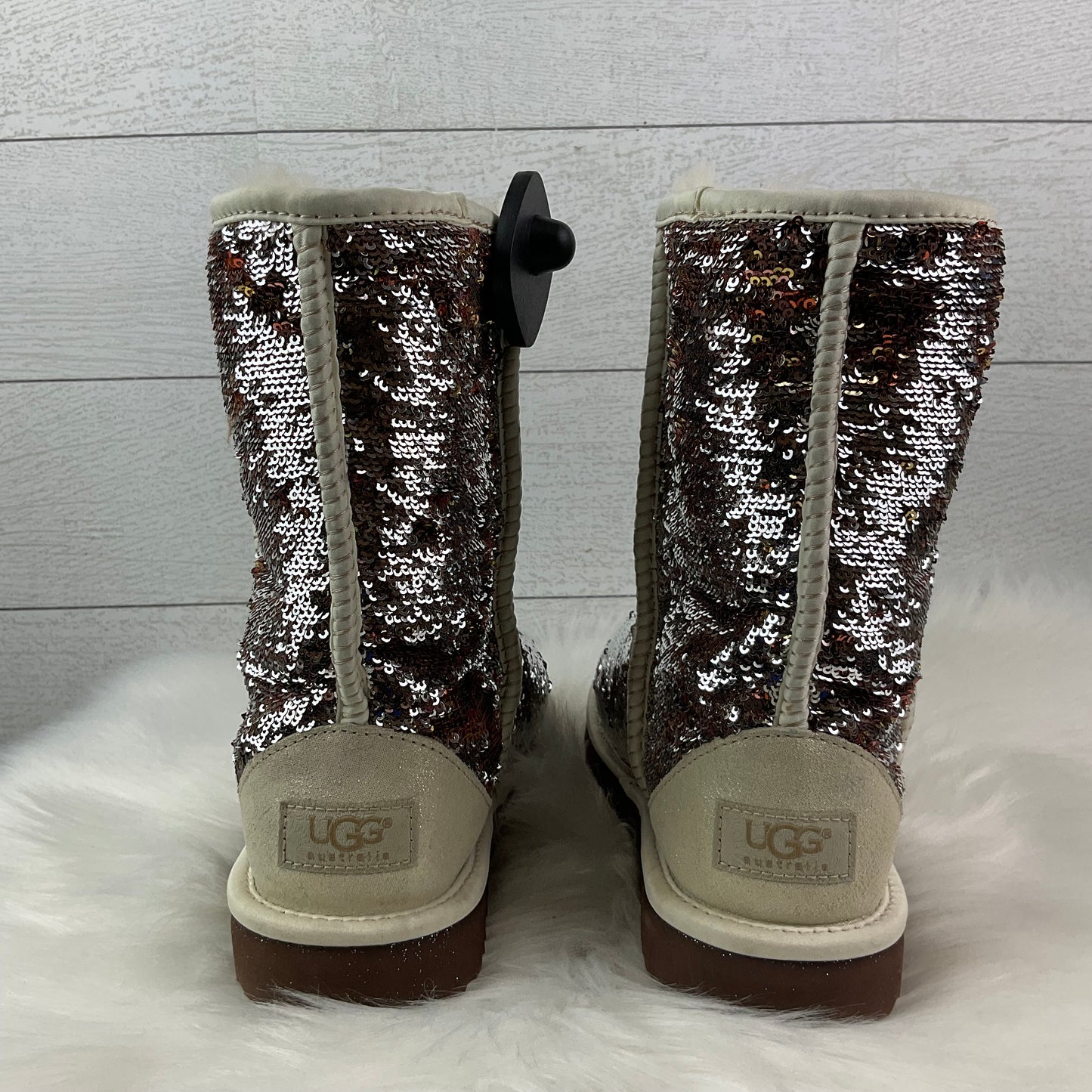 Boots Designer By Ugg In Silver, Size: 7