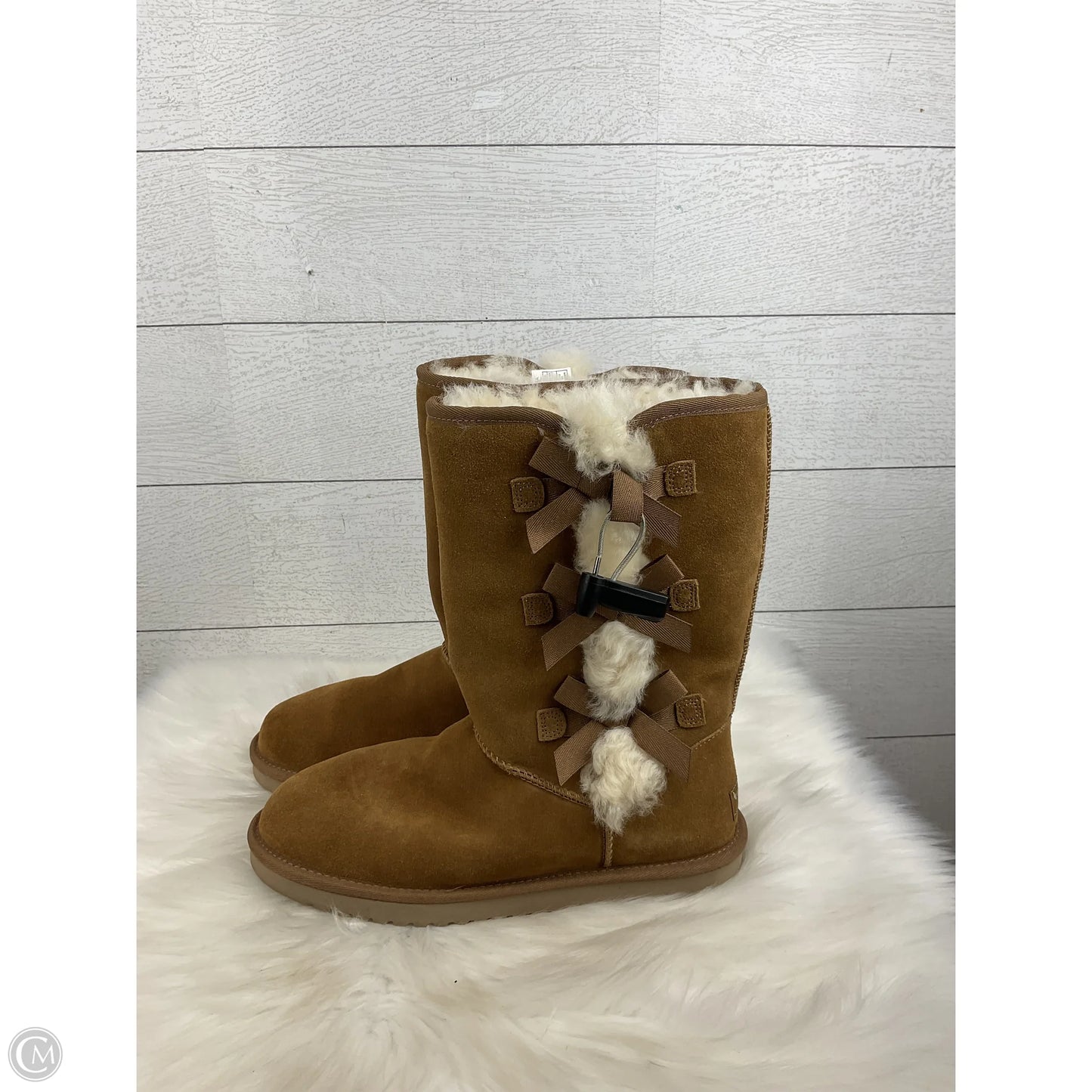 Boots Designer By Ugg In Brown, Size: 9